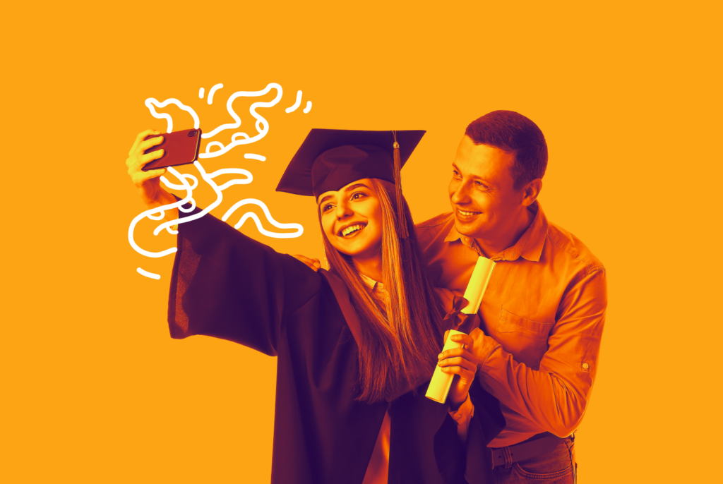 A graduate is with a friend holding a diploma and taking a selfie. There are animated tentacles coming out of the phone.